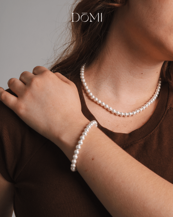 PULSEIRA COM PÉROLAS SHELL PRATA RODINADA - Imagem 2